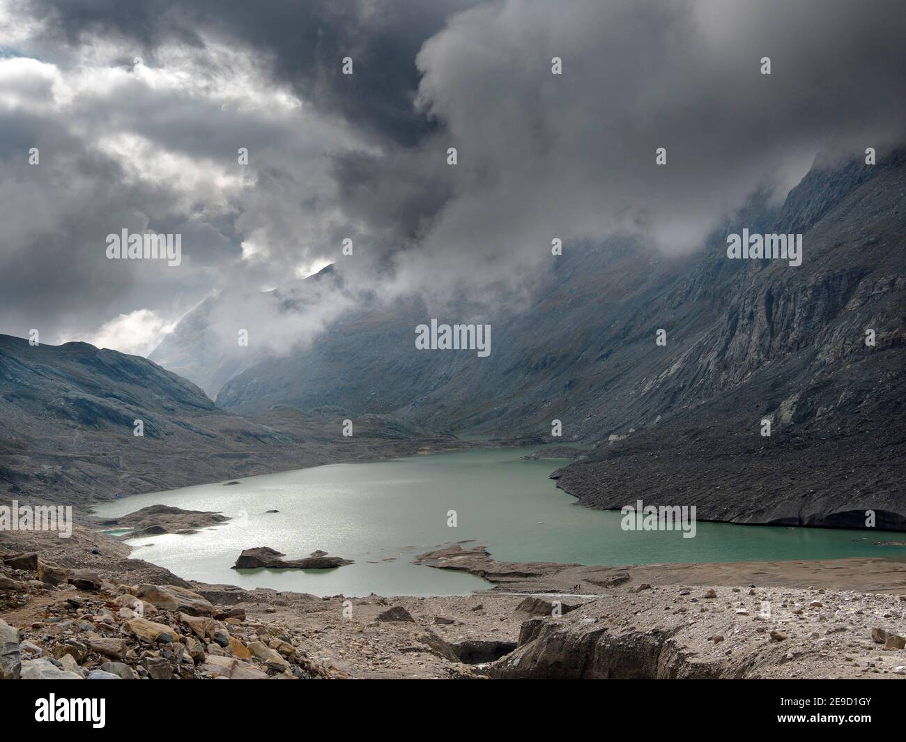 Gletschersee des Glacier Pasterze am Großglockner, der aufgrund der globalen Erwärmung extrem schnell schmilzt. Europa, Österreich, Kärnten Stockfoto