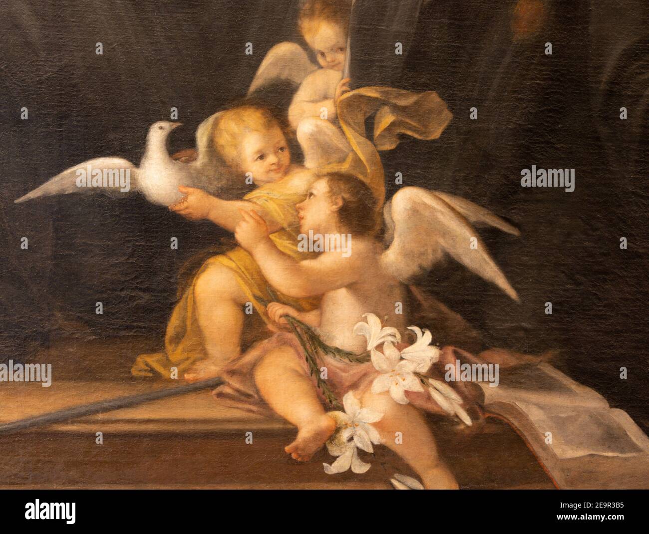 RAVENNA, ITALIEN - 28. JANUAR 2020: Die barocken Engel withthe Tauben detai der Malerei der Anbetung von zwei Nonnen der Heiligen Dreifaltigkeit von Stefano Montanari Stockfoto