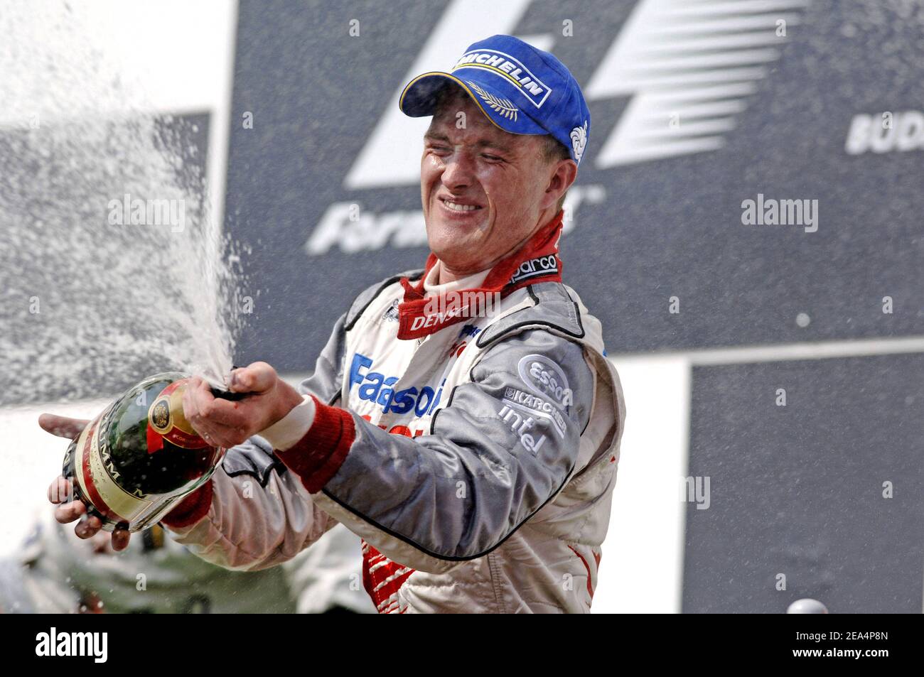 Podium von Ungarn G.P, Hungaroring Circuit, in der Nähe von Budapest, Ungarn, am 31. Juli 2005. Kimi Räikkönen gewann das Rennen vor Michael Schumacher und Ralf Schumacher. Foto von Thierry Gromik/CAMELEON/ABACAPRESS.COM Stockfoto