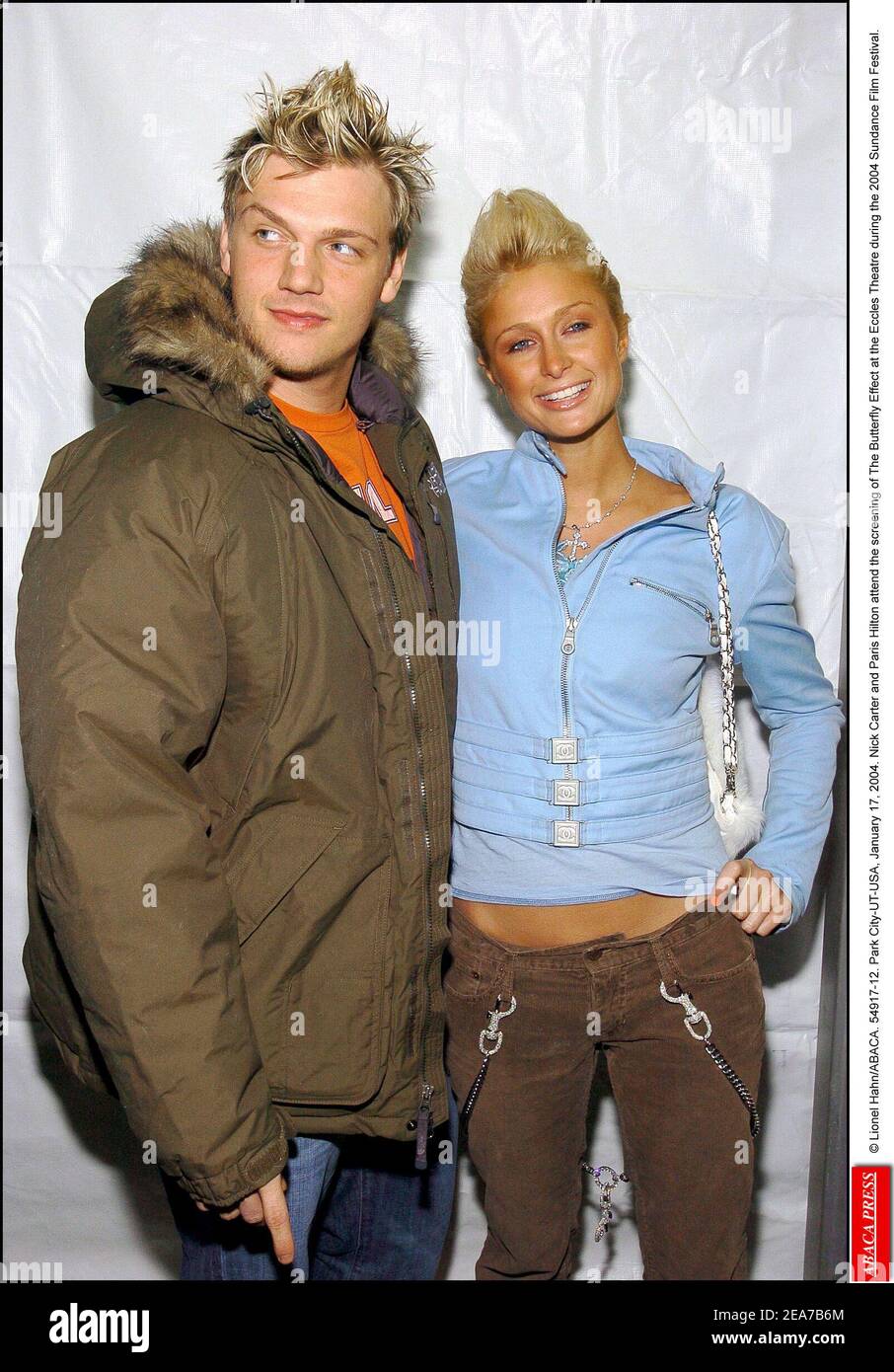 © Lionel Hahn/ABACA. 54917-12. Park City-UT-USA, 17. Januar 2004. Nick Carter und seine Freundin Paris Hilton nehmen an der Vorführung des Butterfly Effect im Eccles Theatre während des Sundance Film Festivals 2004 Teil. Stockfoto