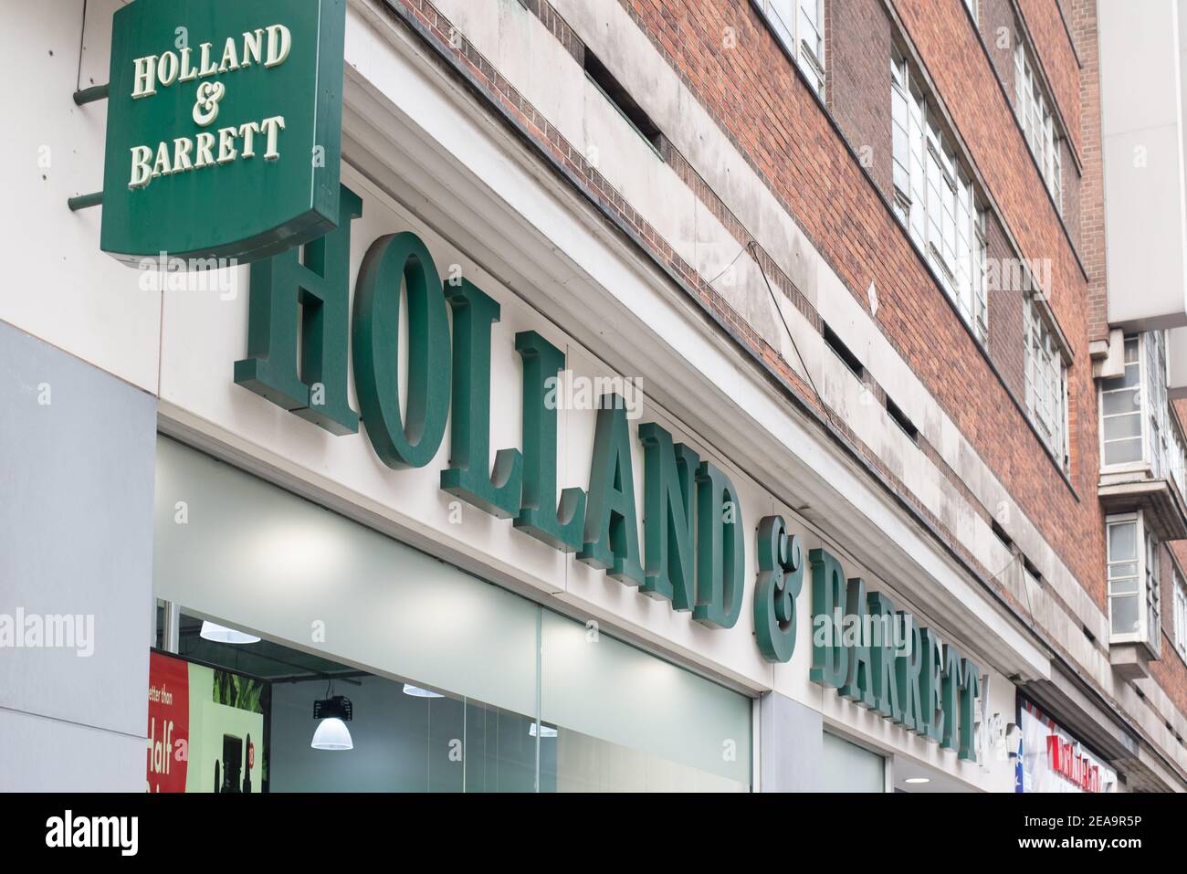 Logo Shop Ladenschild Marke Front Retail Händler Health Store Holland & Barrett, 526 Oxford Street, London W1C 1LN Stockfoto