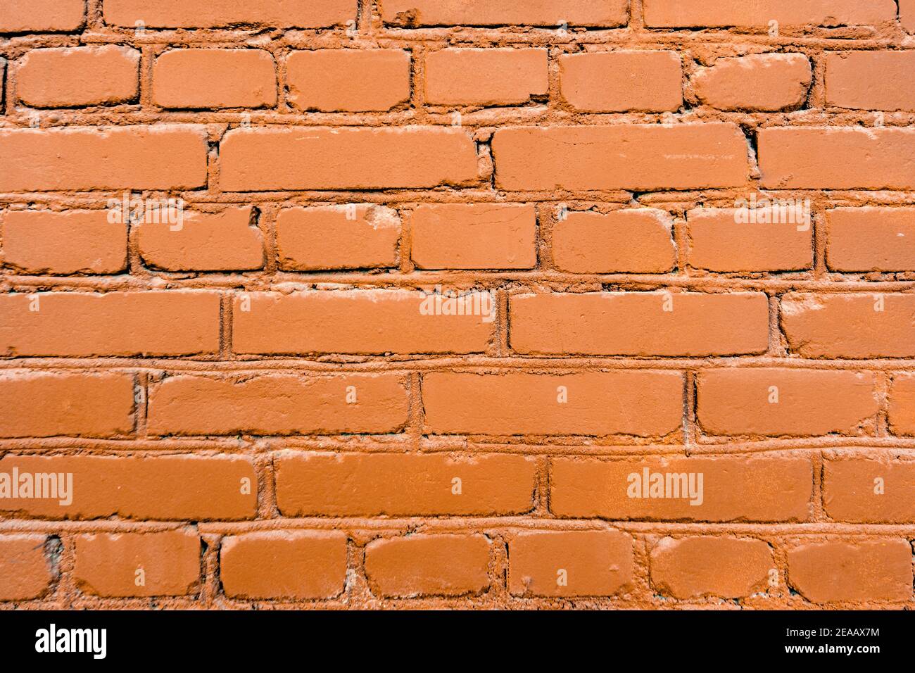 Rotes Ziegelmuster, Ziegelsteinmauer in Nahaufnahme und Steinhintergrund Stockfoto