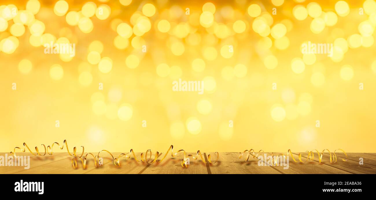 Verschwommener goldener Silvesterhintergrund Stockfoto