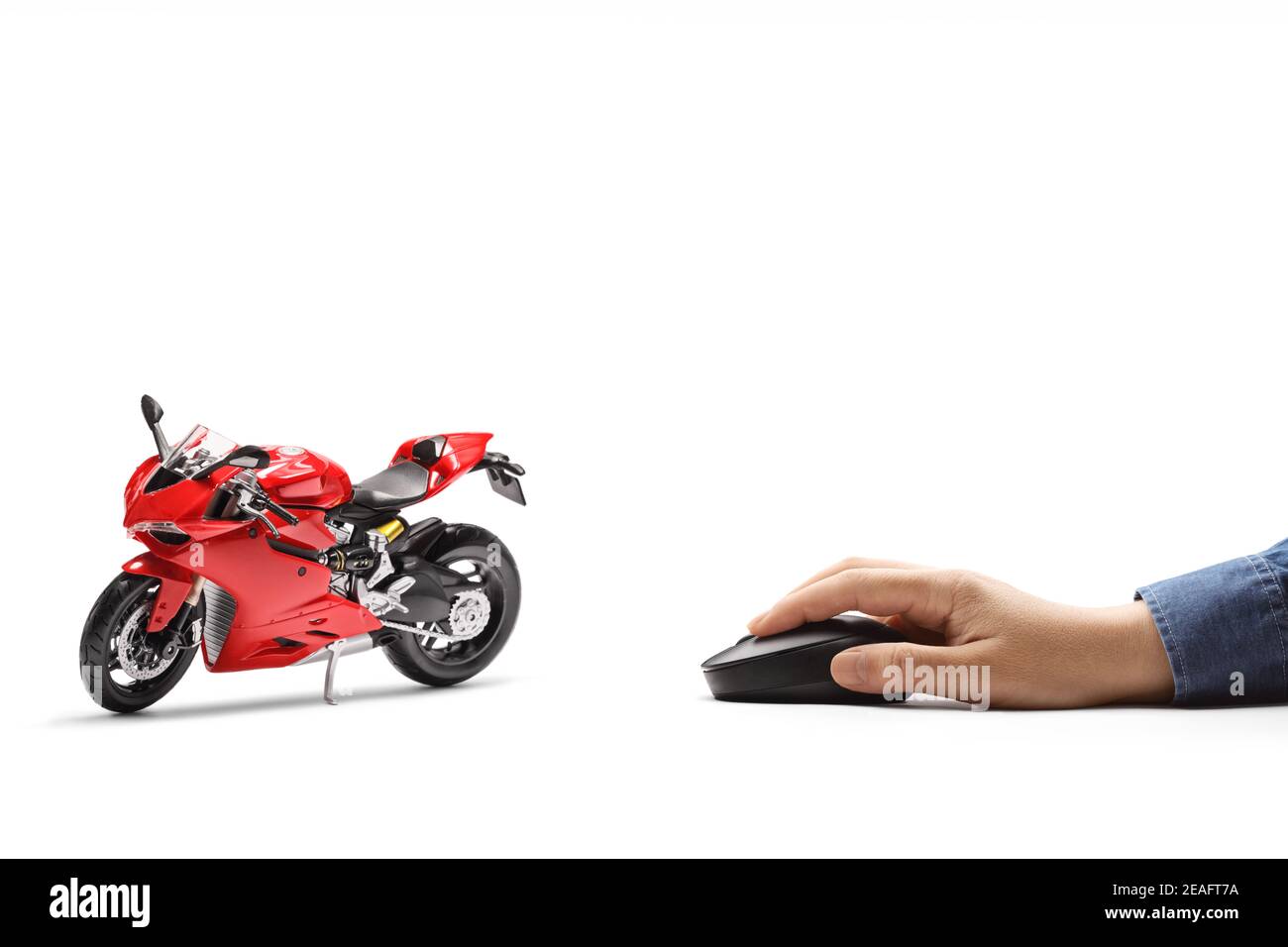 Männliche Hand auf eine Computermaus und eine rote klicken Rennmotorrad isoliert auf weißem Hintergrund Stockfoto