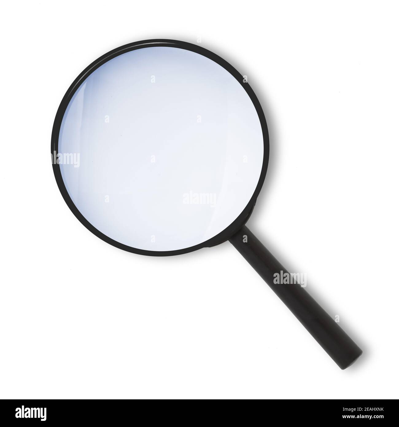 Vergrößerungsglas von oben mit blau getönter Linse Stockfoto
