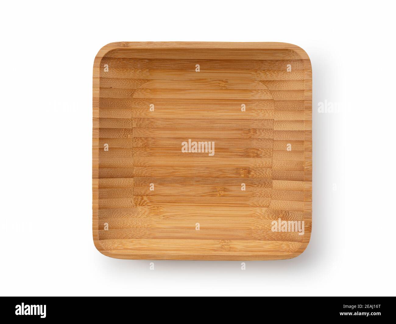 Holzteller auf weißem Hintergrund Stockfoto