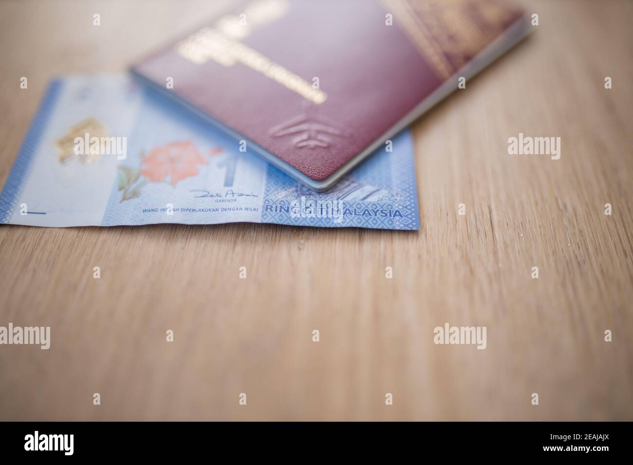 Schweden Pass deckt einen Teil einer Malaysischen Ringgit Note ab Stockfoto