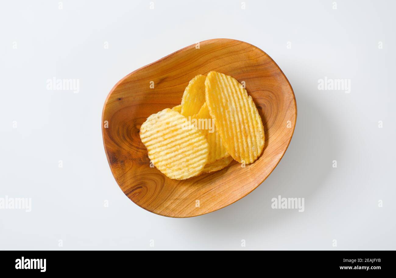 Zerrippte Kartoffelchips Stockfoto