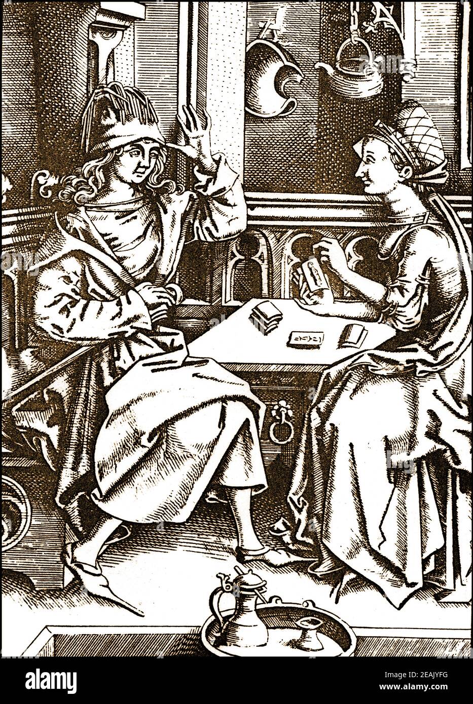 Eine Szene, in der ein mittelalterlicher Mann sein Vermögen von einem Tarot-Leser erzählt hat. Stockfoto