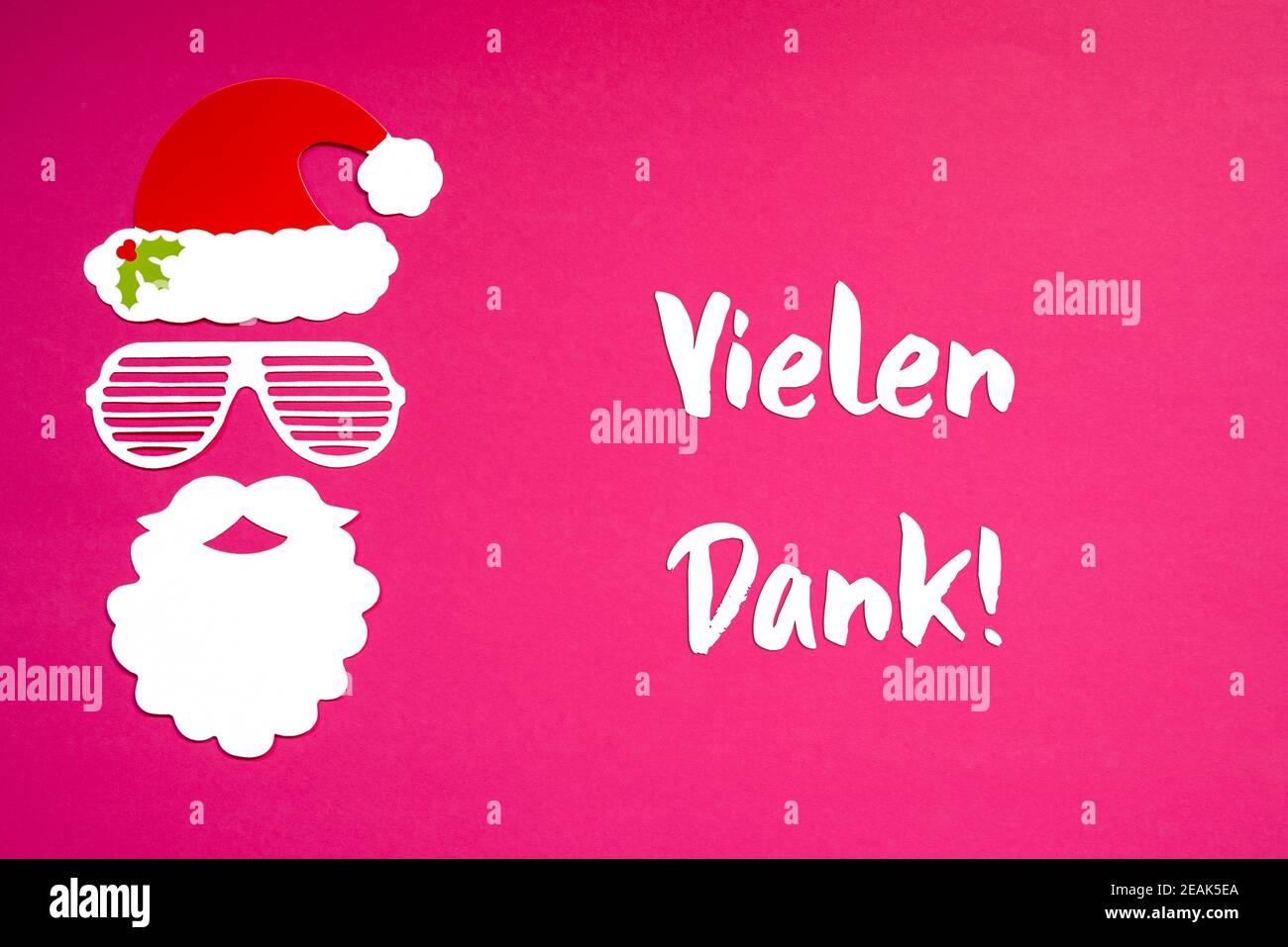 Weihnachtsmann Papiermaske, Rosa Hintergrund, Danke Bedeutet Danke Stockfoto