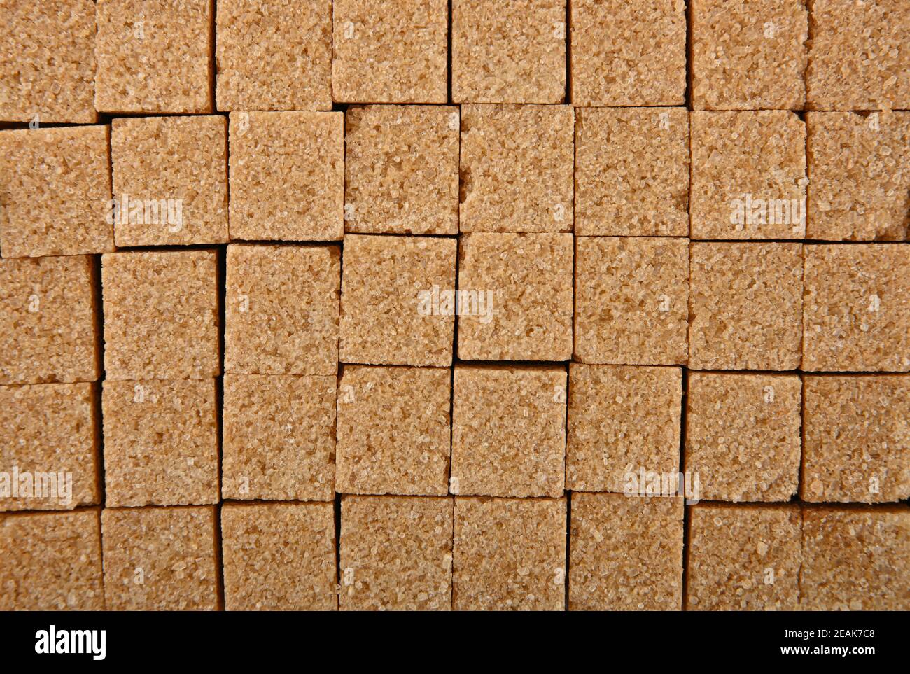 Hintergrund Textur Muster von braunen Zuckerwürfeln Stockfoto