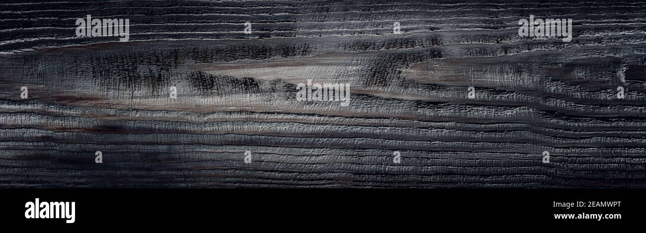 Graues Holz- Hintergrund mit Alte bemalte Platten Stockfoto