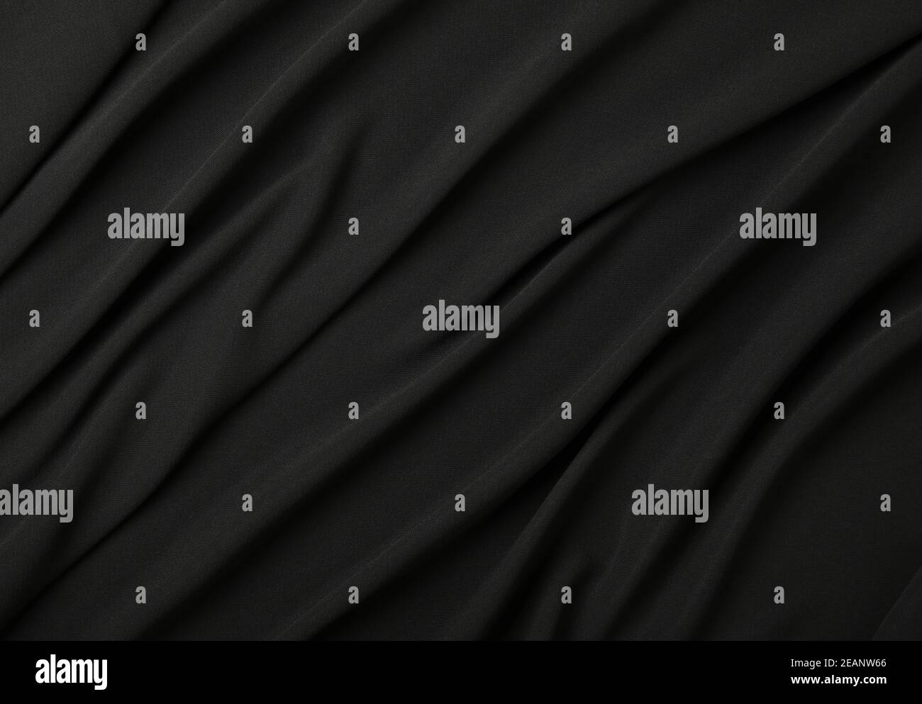 Hintergrund aus schwarzem Textil gefaltet Falten Stockfoto
