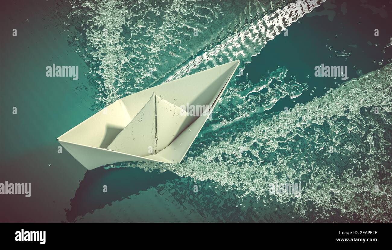 Papierboot segelt auf dem Meer. Stockfoto