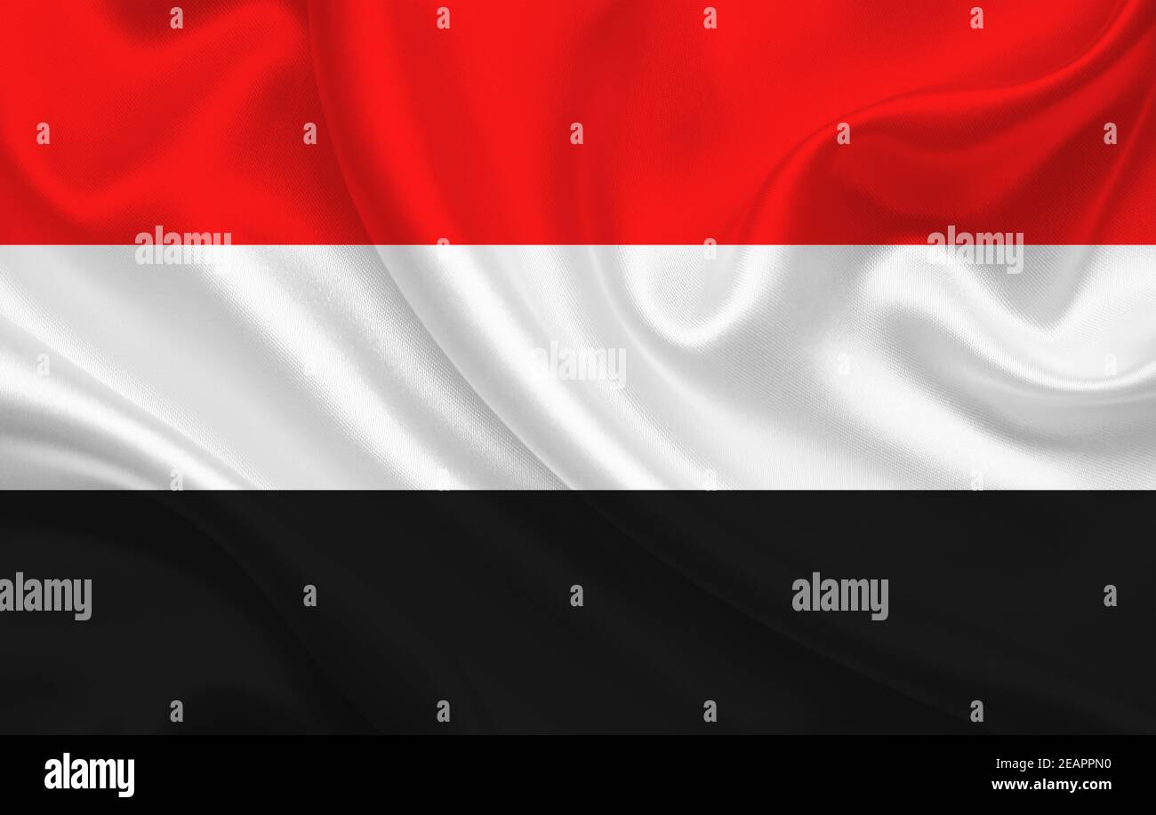 Jemen Land Flagge auf welligen Seide Stoff Hintergrund Panorama Stockfoto