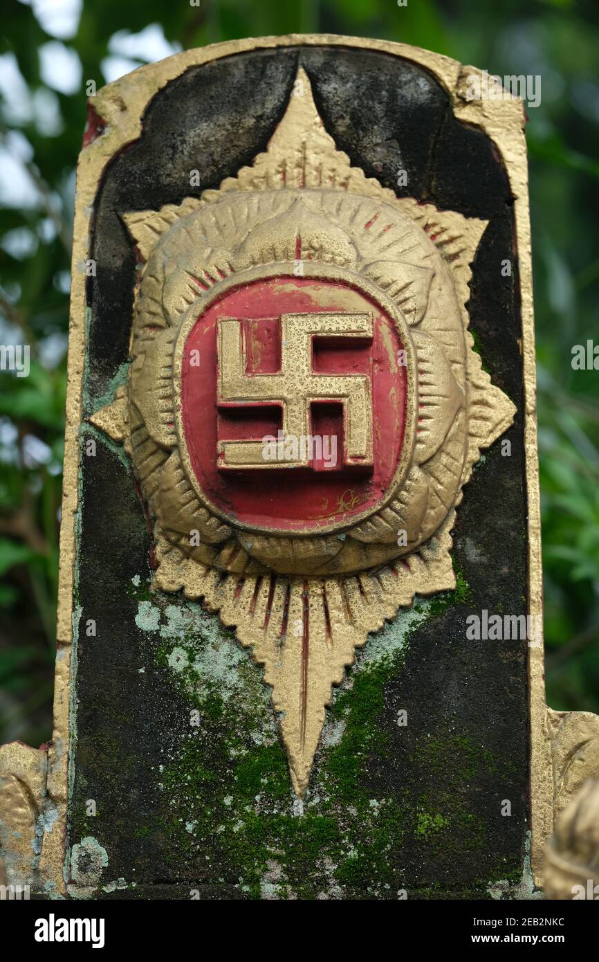 Indonesien Bali - Ubud antikes religiöses Hakenkreuz Symbol - nach rechts gerichtet Oder im Uhrzeigersinn Stockfoto