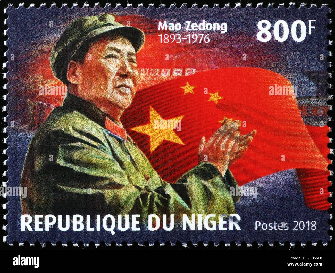 Mao Zedong und chinesische Flagge auf afrikanischer Briefmarke Stockfoto