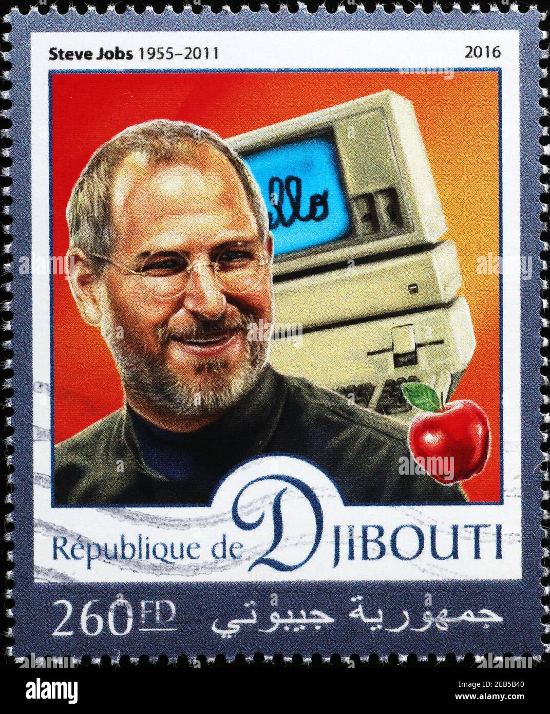 Steve Jobs mit einem sehr alten Apple Computer auf Briefmarke Stockfoto