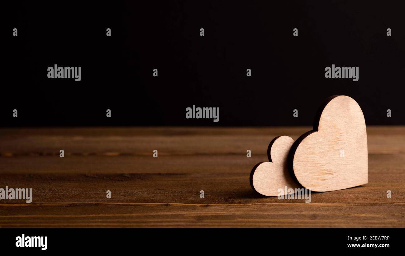Hintergrund mit Holzherzen, Platz für Text Stockfoto