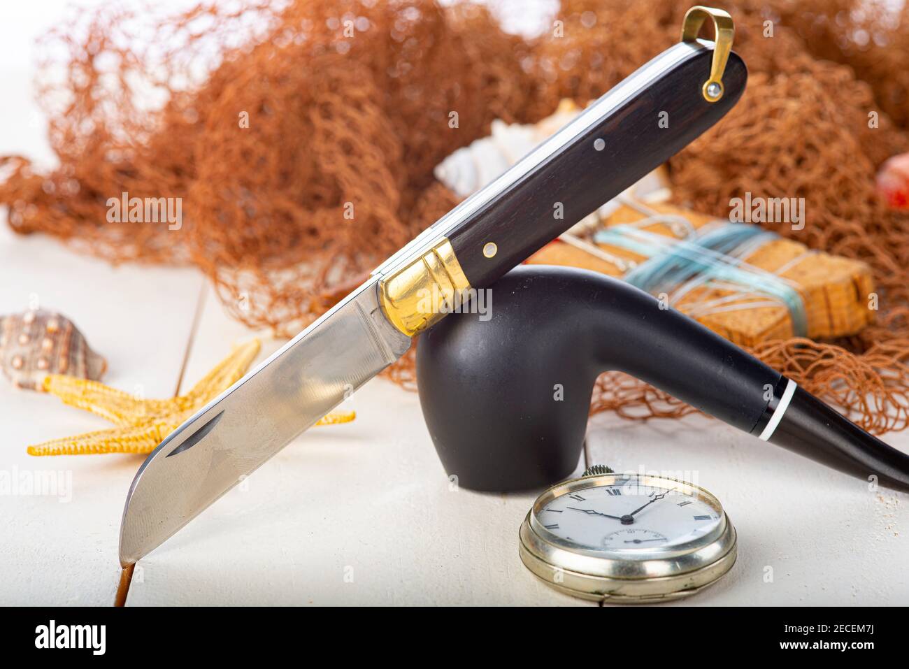 Vintage Stillleben über das Fischen mit einer Pfeife und ein Segelmesser Stockfoto