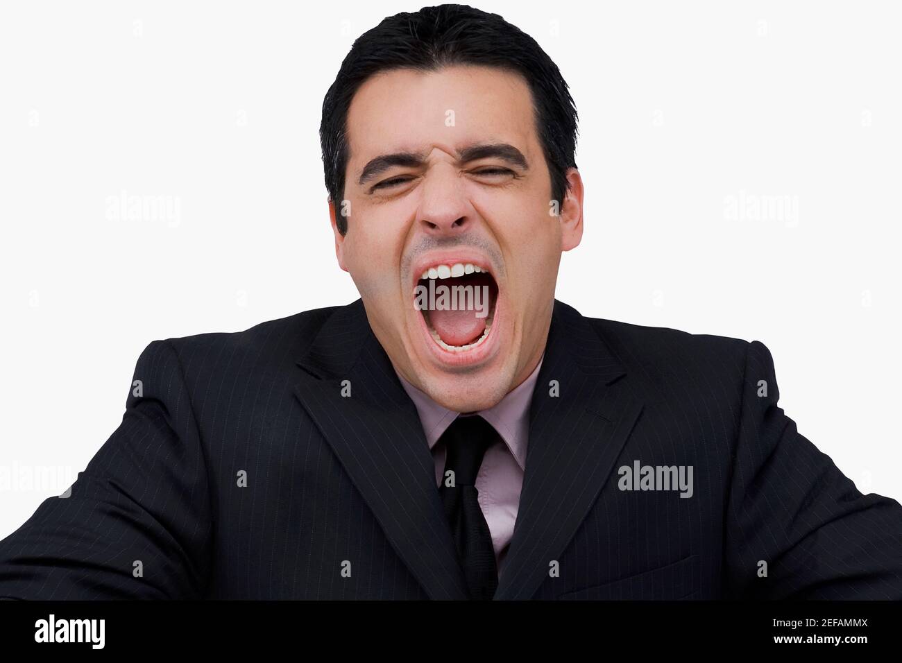 Nahaufnahme eines Geschäftsmannes, der schreit Stockfoto