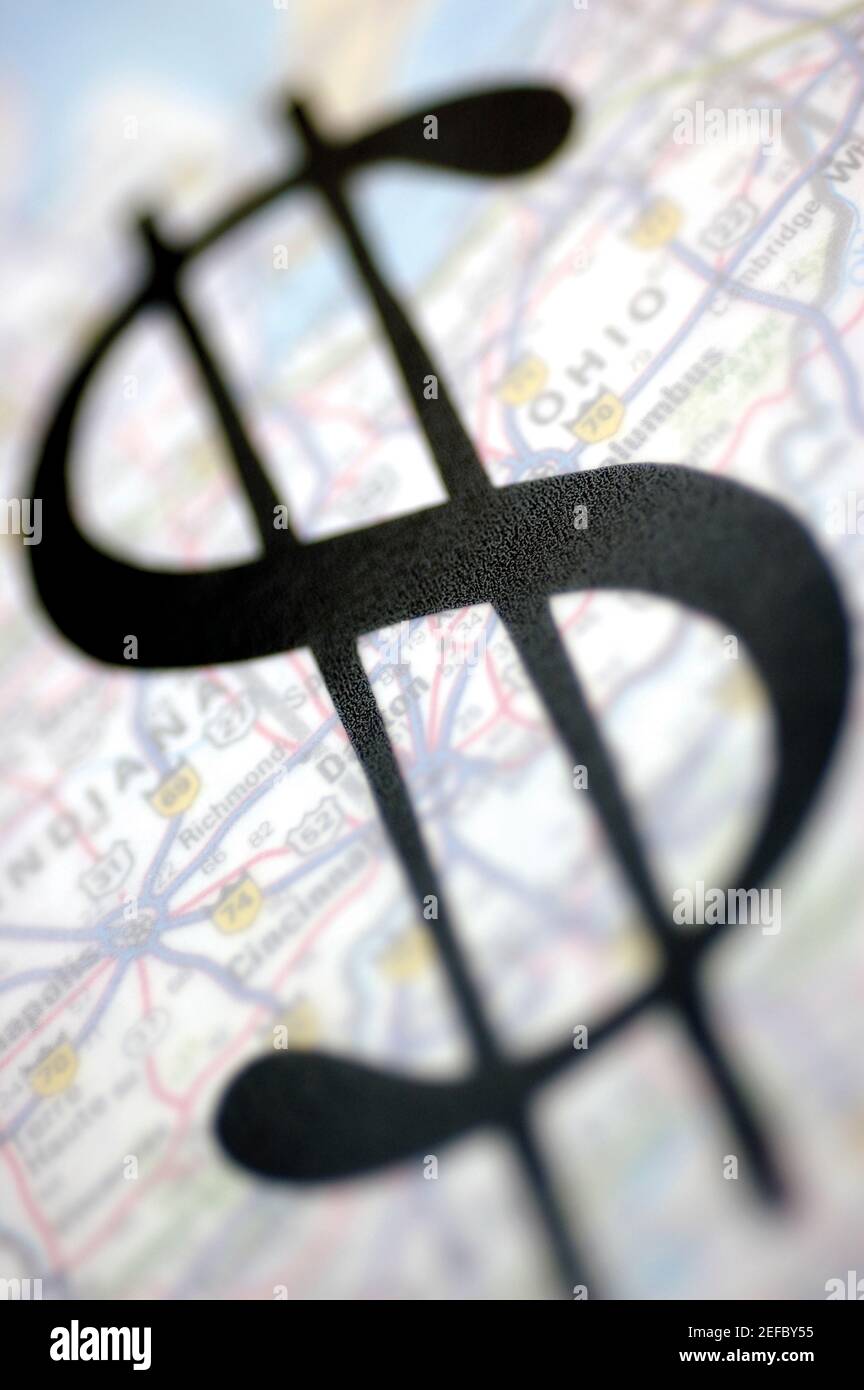 Nahaufnahme eines Dollarzeichens auf einem Globus Stockfoto