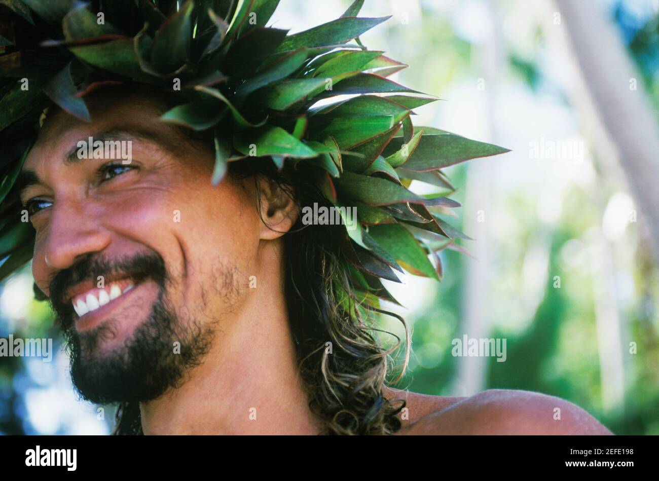 Nahaufnahme eines lächelnden jungen Mannes, Hawaii, USA Stockfoto