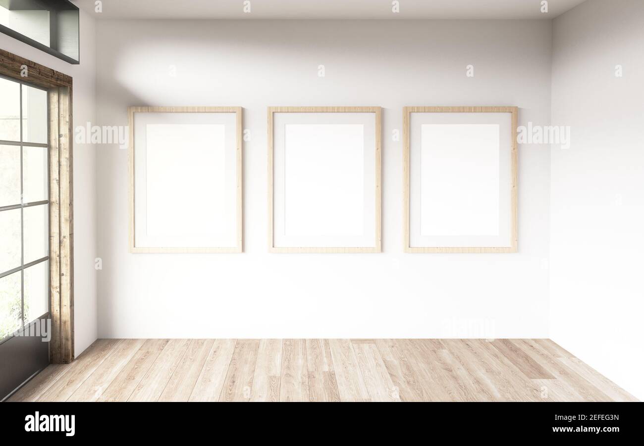 Drei blanck-Rahmen in einem Raum mit großen Fenstern. 3D Rendern Stockfoto
