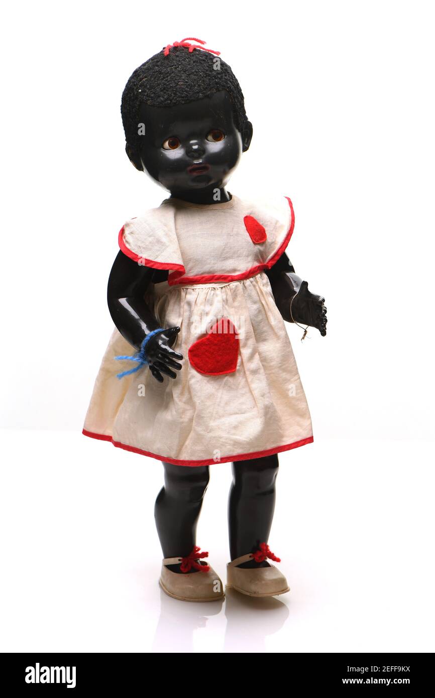 Antike Kinder-Ahnentafel schwarze Puppe aus dem frühen 50s ursprünglich in Guernsey Channel Inseln gekauft. Stockfoto