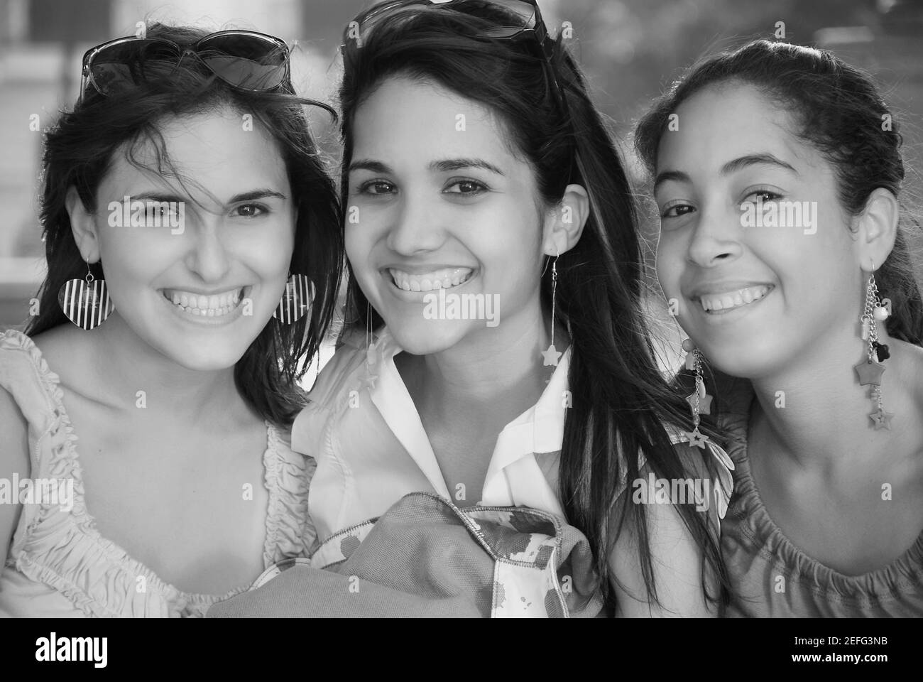 Porträt von drei jungen Frauen Lächeln Stockfoto