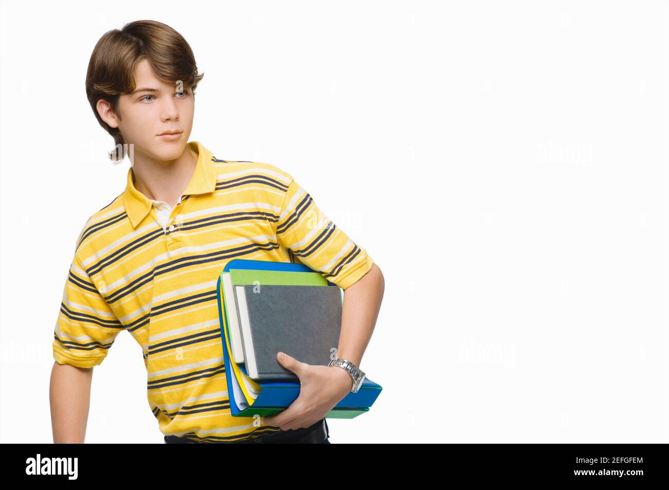 Nahaufnahme von einem Teenager tragen Bücher und Ringbücher Stockfoto