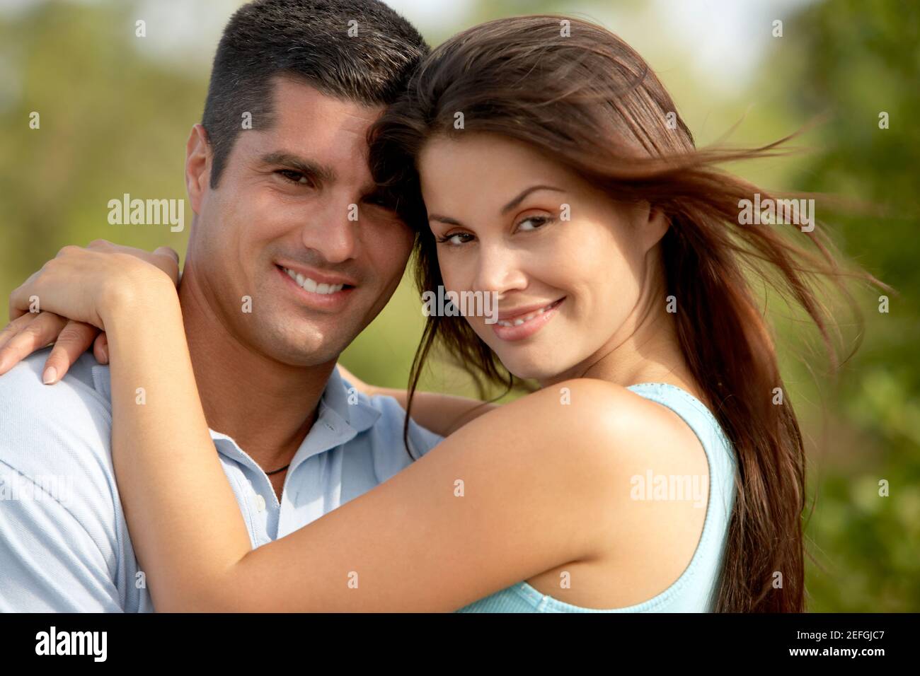 Porträt einer jungen Frau und eine Mitte erwachsener Mann lächelnd Stockfoto