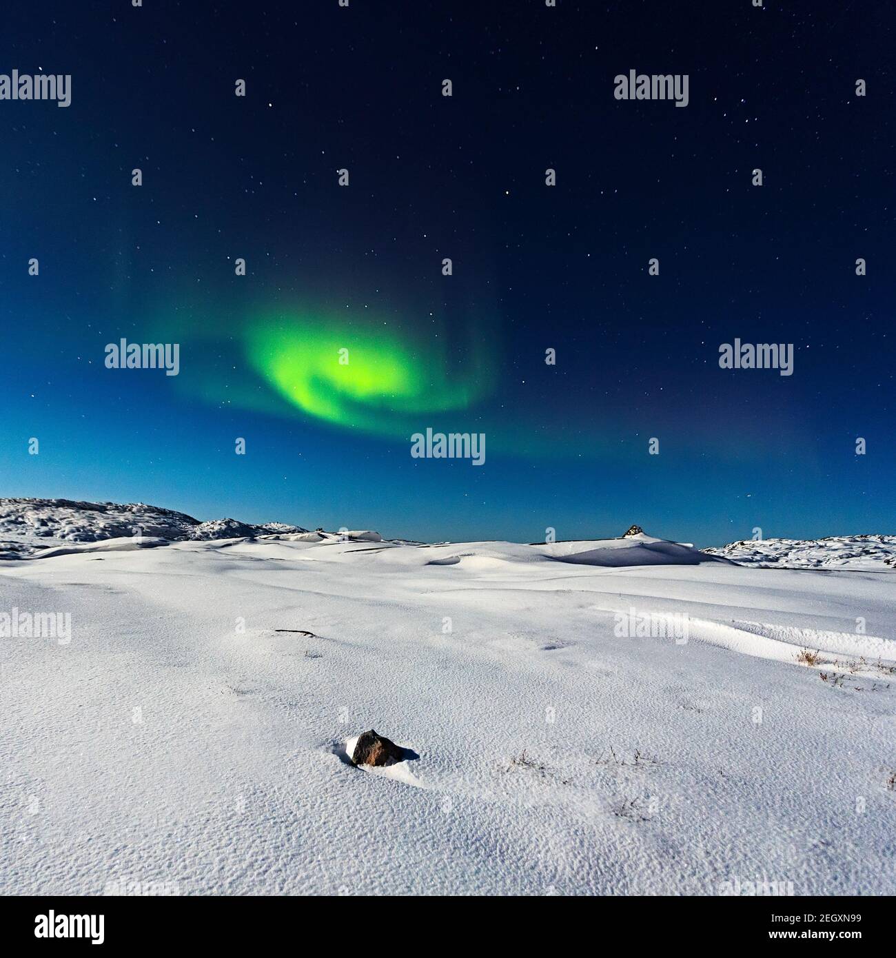 Aurora Borealis über die Winterlandschaft im UNESCO-Weltkulturerbe Ilulissat, Disko Bay, Grönland Stockfoto