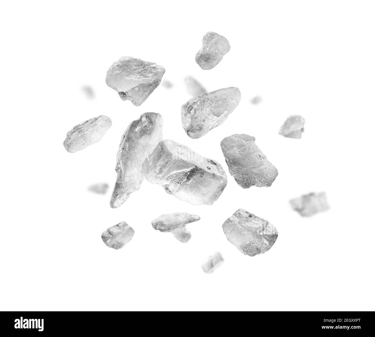 Steinsalz aus nächster Nähe schweben auf weißem Hintergrund Stockfoto