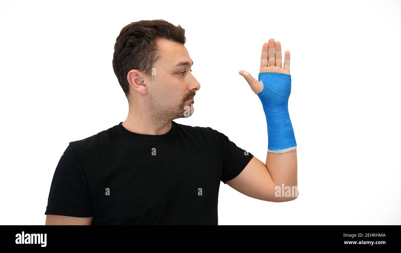 Der Mensch sieht Gips auf weißem Hintergrund Stockfoto