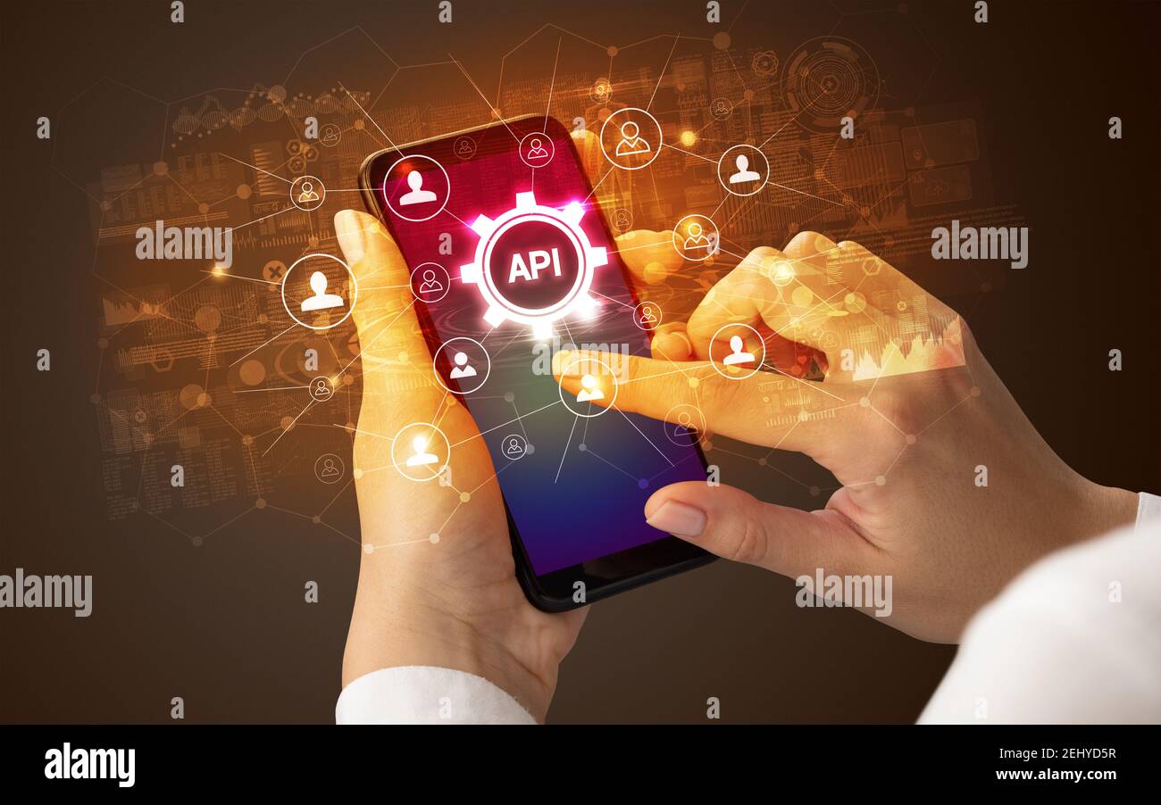 Weibliche hand Smartphone mit API Abkürzung, moderne Technologie Konzept Stockfoto