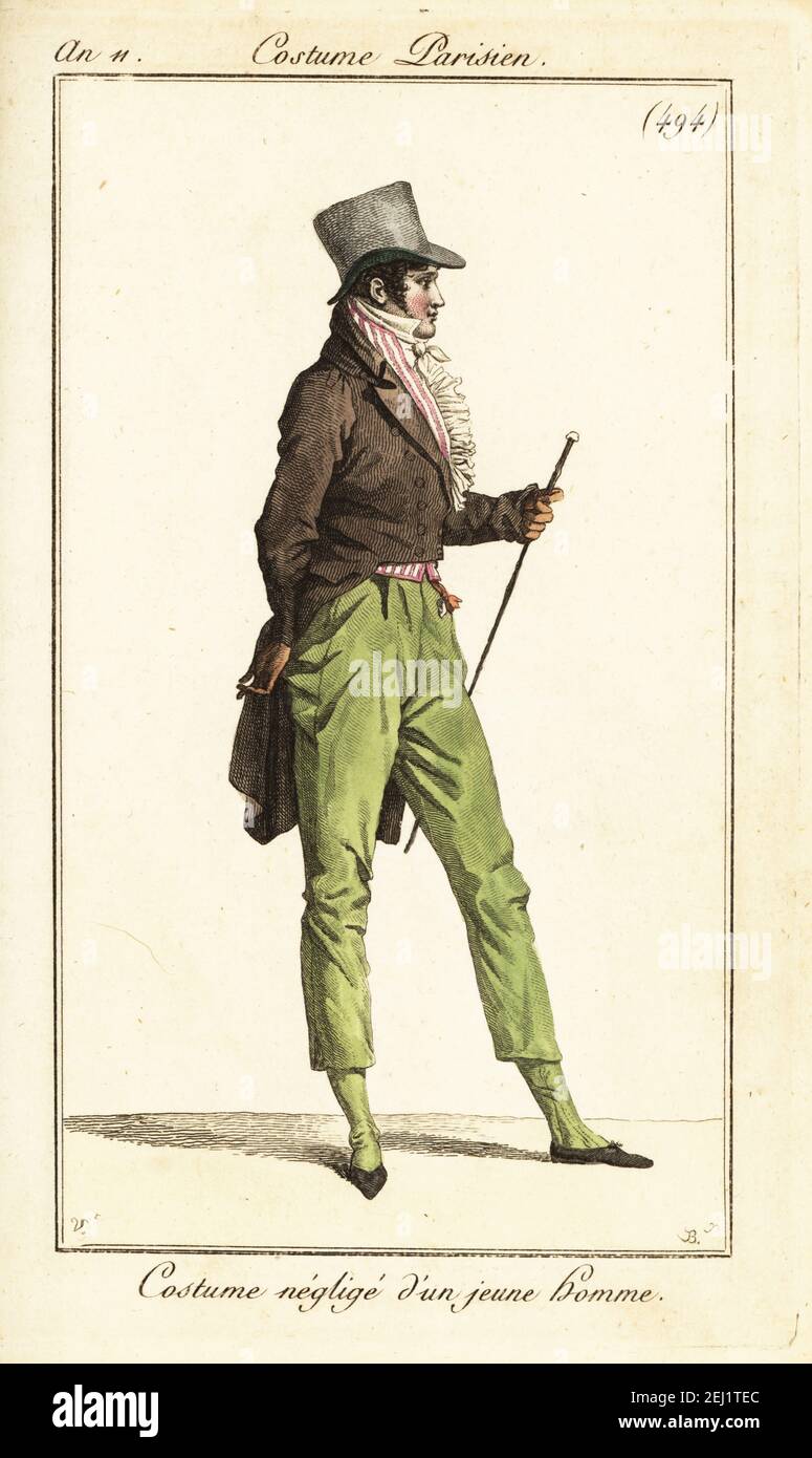 Junger französischer Dandy in lässigem Outfit. Grauer Zylinderhut, gestreifte Weste, Gehrock, Pantalons und Hausschuhe. Kostüm négligé d’un jeune homme. Handkolorierter Kupferstich von Pierre-Charles Baquoy nach Carle Vernet aus Pierre de la Mesangeres Journal des Dames et des Modes, Magazine of Women and Fashion, Paris, an 11, 1803. Stockfoto