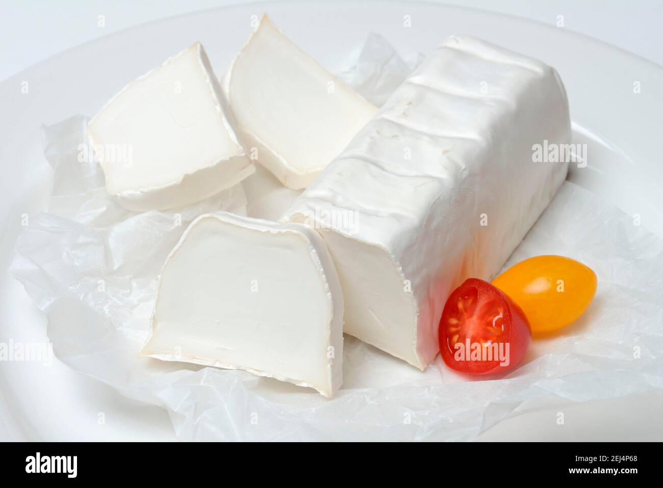 Ziegenkäse mit Kirschtomaten, Ziegenkäse Stockfoto