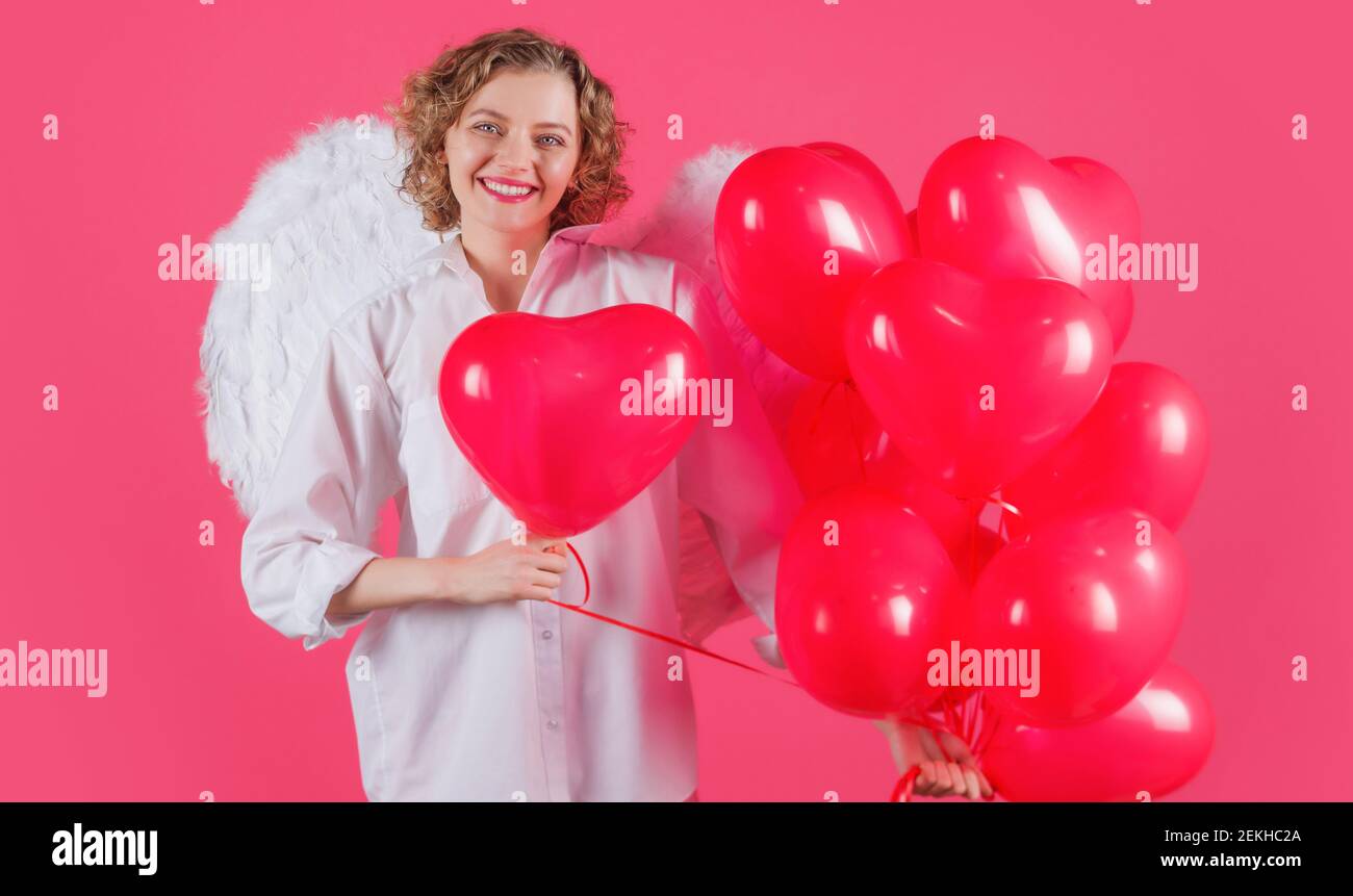 Valentinstag. Engel Frau mit Herzform Ballons. Amor am valentinstag Stockfoto