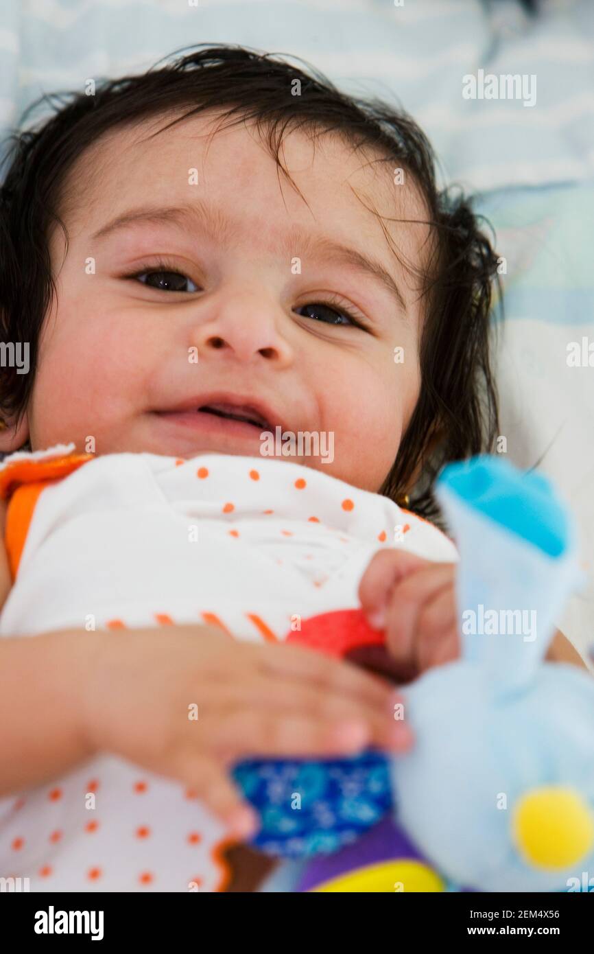 Porträt von einem Babymädchen lächelnd Stockfoto