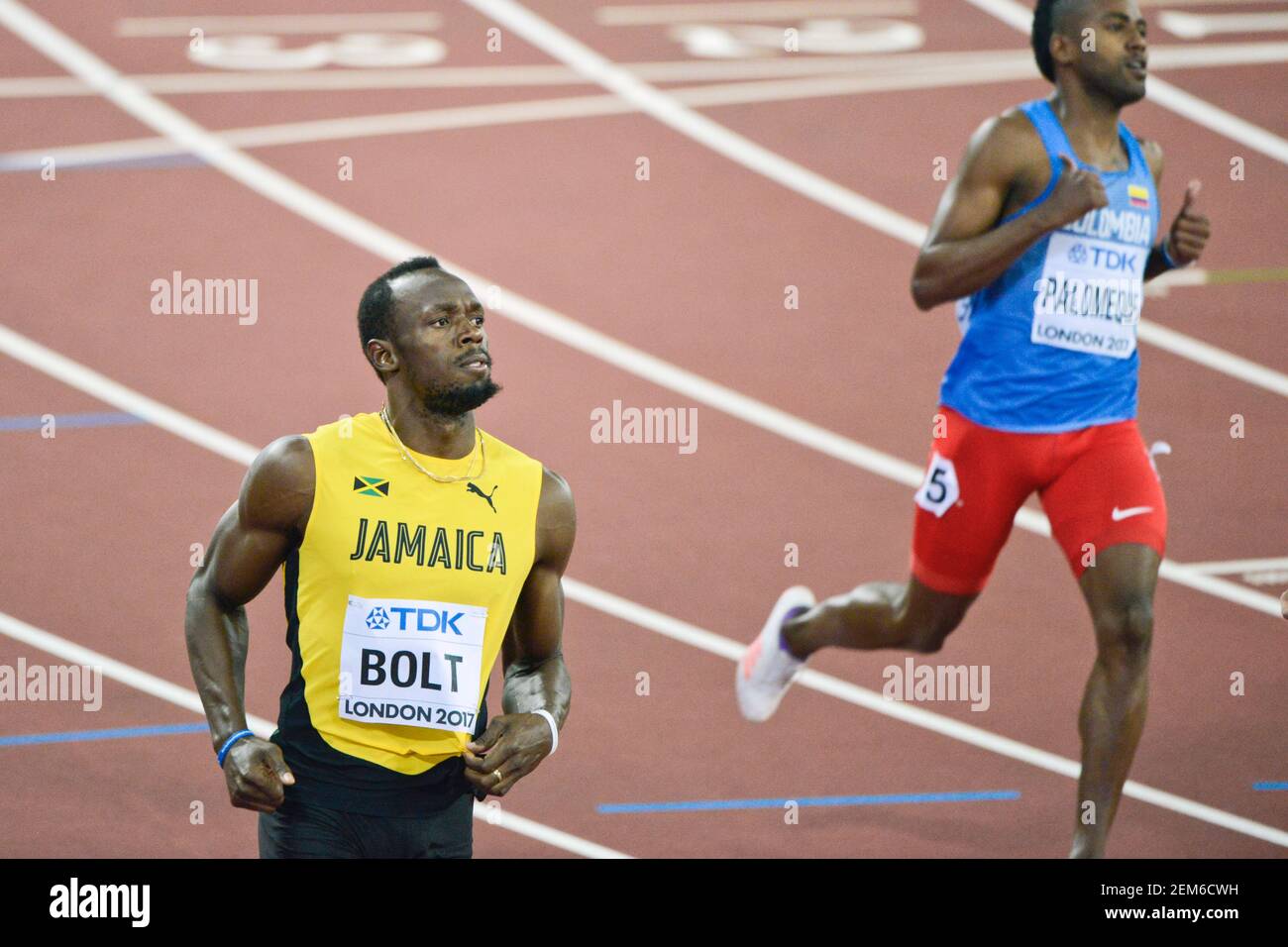 Usain Bolt (Jamaika), Diego Palomeque (Kolumbien). 100 Meter Männer, Vorlauf-Serie - IAAF Leichtathletik-Weltmeisterschaften - London 2017 Stockfoto