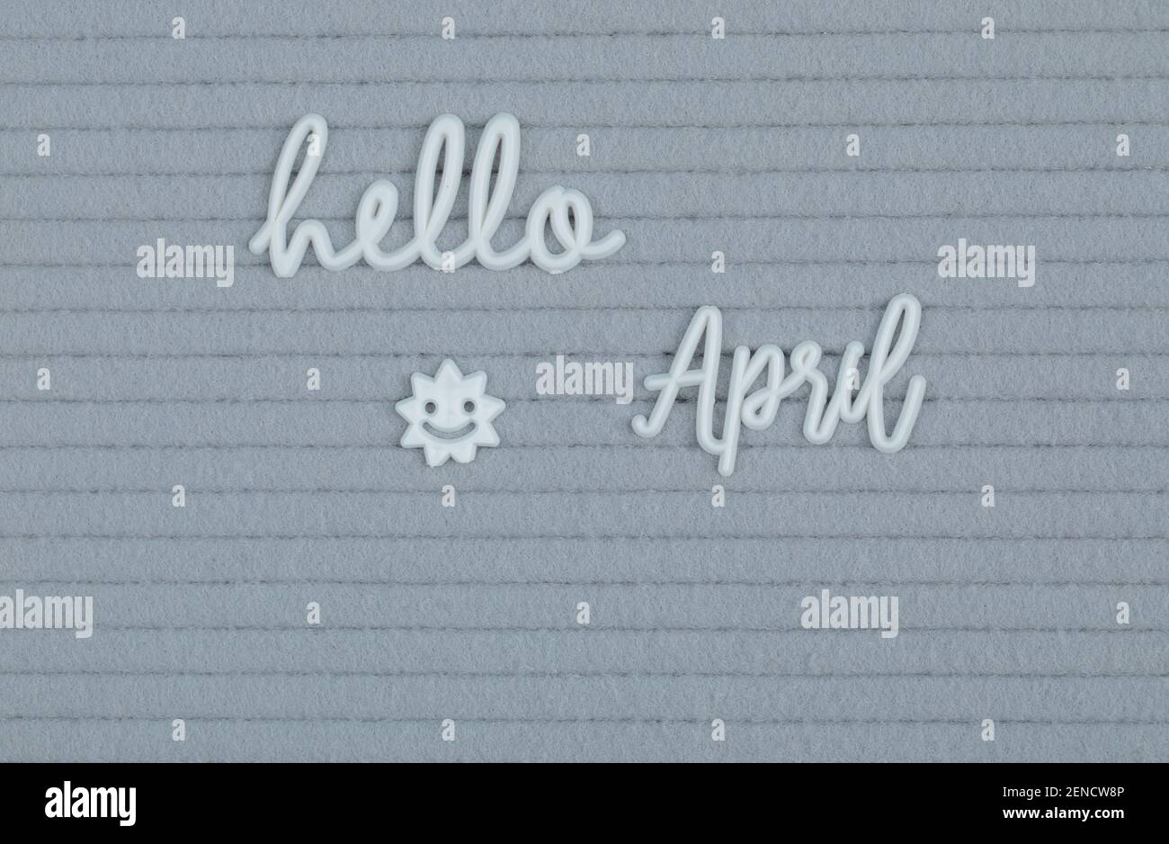 Hello april Poster auf grauem Hintergrund Stockfoto