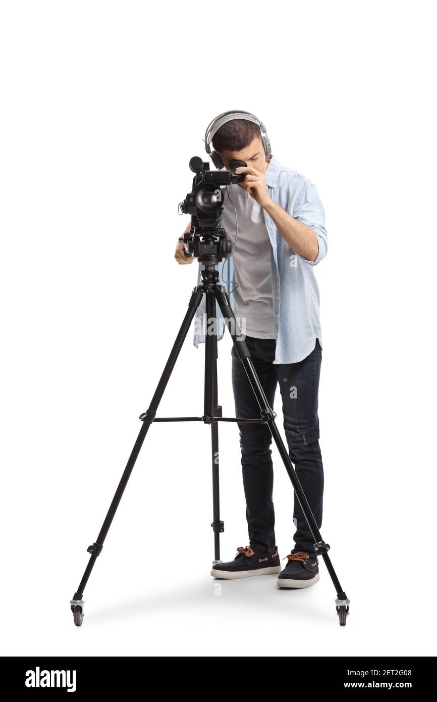 Junger Mann, der mit einer Kamera auf einem Stativ aufzeichnet Isoliert auf weißem Hintergrund Stockfoto
