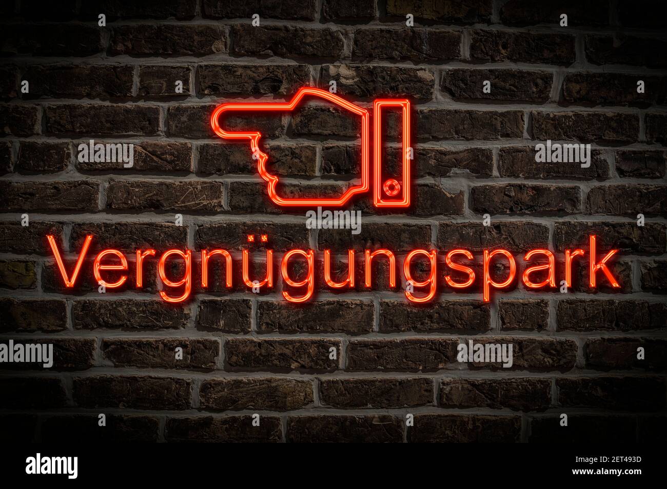 Detailfoto eines Neonschildes an einer Wand mit Die Inschrift Vergnügungspark Stockfoto