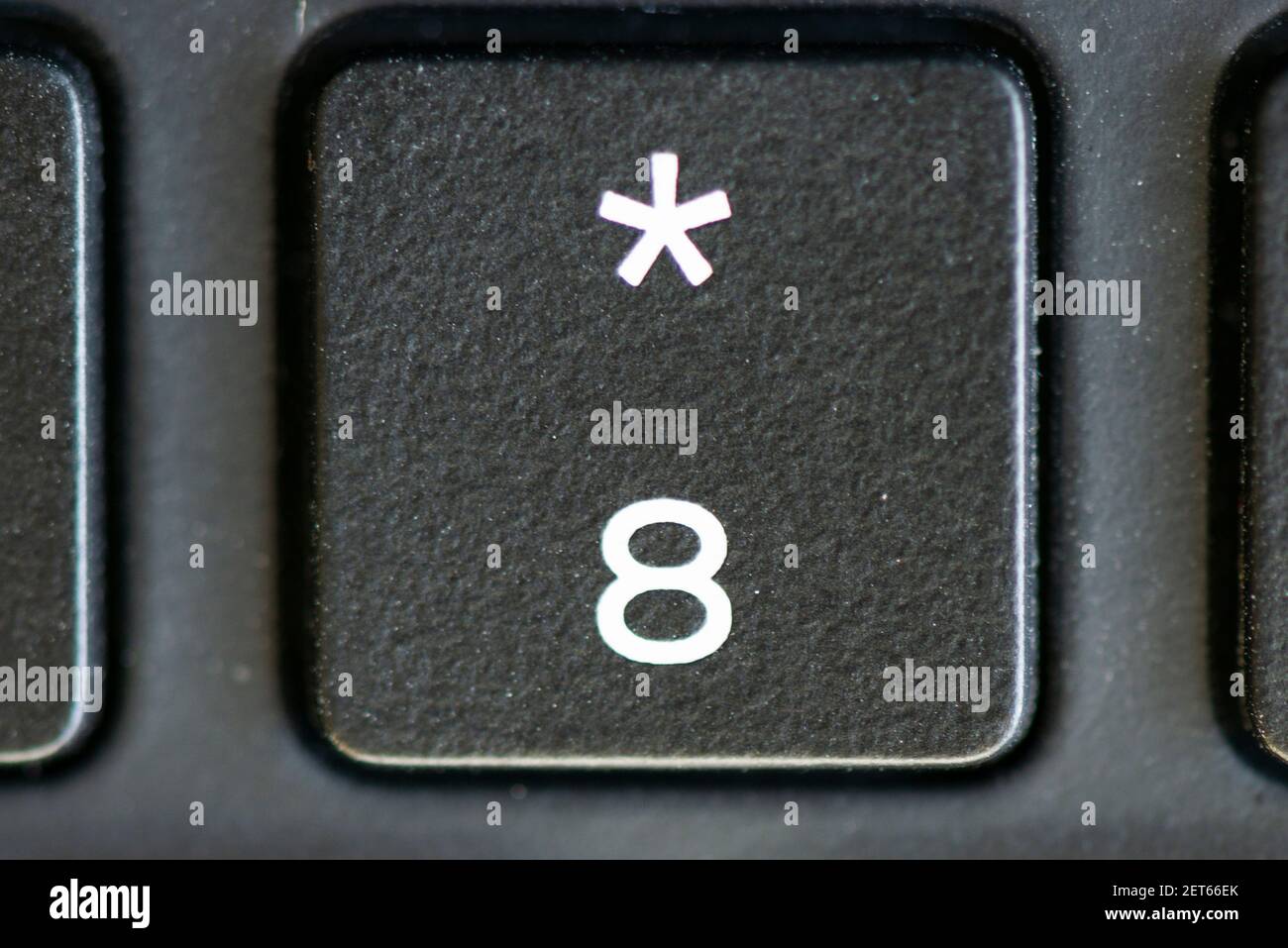 8 und Sternchen-Taste auf einer Laptop-Tastatur Stockfotografie - Alamy