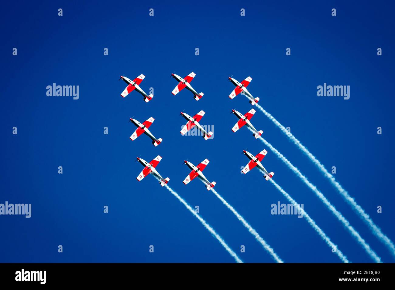Swiss Air Force Pilatus PC-9 Trainerflugzeuge Kunstflug-Formationsflug auf der Flugschau auf der Luftwaffenbasis kleine-Brogel. Belgien - 13. September 2014 Stockfoto