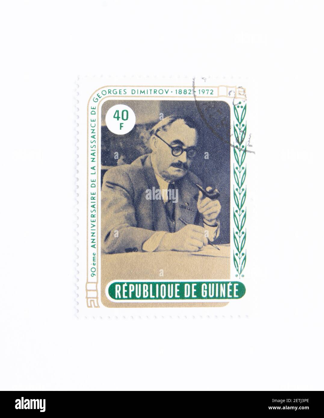 Guinea Republik Briefmarke. Um 1972. 90th. Jahrestag der Geburt Georgi Dimitrovs. Gründer der kommunistischen Herrschaft und erster bulgarischer Ministerpräsident. Stockfoto