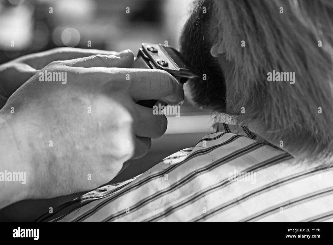 Brutale Haarschnitte. Friseurausrüstung. Selektiver Fokus. Beard man. Stockfoto