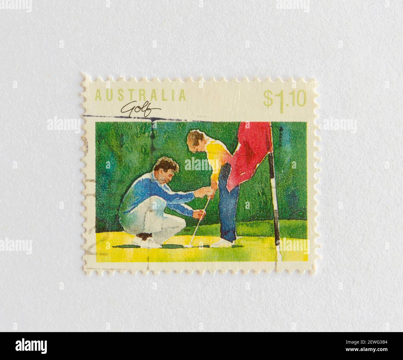 03.03.2021 İstanbul Türkei. Briefmarke. AUSTRALIEN - UM 1989: Briefmarke gedruckt in Australien mit Bild eines Trainers und eines jungen Golfspielers. Stockfoto