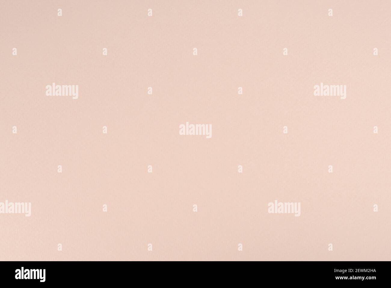Blass rosa Papier Hintergrund. Kokosnuss weiß Farbe Papier Textur. Matte monochrome Oberfläche. Stockfoto